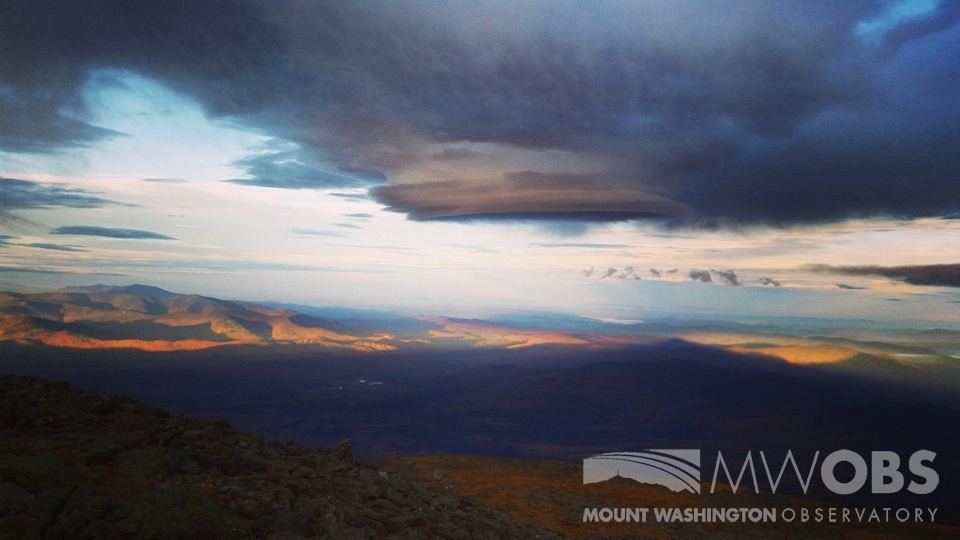 Lenticular cloud with fall foliage below