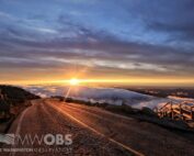 Late summer sunrise looking down the Mt. Washington Auto Road at the summit